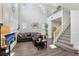 Spacious living room features high ceilings and comfortable seating perfect for relaxing or entertaining at 234 Priority Point St, Henderson, NV 89012