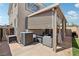 Outdoor patio with comfortable seating and privacy features offers a peaceful retreat at 234 Priority Point St, Henderson, NV 89012