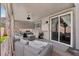 This delightful covered patio offers plush seating, and easy access to both the home and the backyard at 234 Priority Point St, Henderson, NV 89012