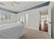 Bedroom with bed, carpet, and ensuite bathroom at 2445 Ping Dr, Henderson, NV 89074