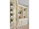 Custom built-in shelving in the living room at 2445 Ping Dr, Henderson, NV 89074