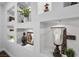 Close-up of decorative niches with recessed lighting, adding charm to the hallway at 2445 Ping Dr, Henderson, NV 89074