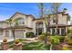 Beautiful two-story home with well-maintained landscaping and a spacious three-car garage at 2445 Ping Dr, Henderson, NV 89074