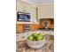 Close-up of kitchen with stainless steel microwave and stylish backsplash at 2445 Ping Dr, Henderson, NV 89074