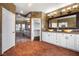 A bathroom with double sinks and white cabinets at 2445 Ping Dr, Henderson, NV 89074