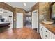 A bathroom with a walk-in shower and double sinks at 2445 Ping Dr, Henderson, NV 89074