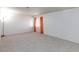 Spacious bedroom with plush carpeting, neutral paint, and abundant natural light at 3939 Jontue St, Las Vegas, NV 89115