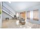 Bright and airy living room featuring high ceilings and tiled floors at 3939 Jontue St, Las Vegas, NV 89115