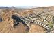 Community aerial view showing new homes nestled in a desert landscape at 41 Strada Moscato, Henderson, NV 89011