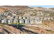 Aerial view of a community featuring houses nestled in a desert landscape at 41 Strada Moscato, Henderson, NV 89011