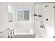 Pristine bathroom featuring a soaking tub, glass shower, and bright natural light at 41 Strada Moscato, Henderson, NV 89011