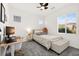 Bright bedroom featuring a comfortable bed, modern desk, and great natural light at 41 Strada Moscato, Henderson, NV 89011