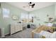 Adorable Bedroom featuring a crib, changing table, and plenty of room for toys and play at 41 Strada Moscato, Henderson, NV 89011