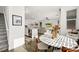 Open concept living area featuring a kitchen, dining area and staircase at 41 Strada Moscato, Henderson, NV 89011