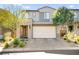 Contemporary two-story home with a two-car garage and low-maintenance desert landscaping at 41 Strada Moscato, Henderson, NV 89011