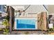 Aerial view of a backyard pool with lounge chairs and minimalist landscaping at 41 Strada Moscato, Henderson, NV 89011