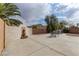 Spacious backyard patio with fountain, desert landscaping, and plenty of room for entertaining at 4216 Thunder Twice St, Las Vegas, NV 89129
