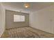 This simple bedroom features carpet and a window allowing for natural light at 4216 Thunder Twice St, Las Vegas, NV 89129