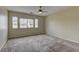 Spacious bedroom featuring neutral walls, carpet flooring, and lots of natural light at 4216 Thunder Twice St, Las Vegas, NV 89129
