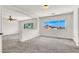 Expansive carpeted bedroom offering abundant natural light and versatile space at 4216 Thunder Twice St, Las Vegas, NV 89129
