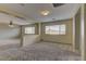 Loft area featuring neutral paint, carpet floors and lots of natural light from the windows at 4216 Thunder Twice St, Las Vegas, NV 89129