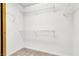 Walk-in closet with white walls, neutral carpet, and wire shelving for plenty of storage space at 4216 Thunder Twice St, Las Vegas, NV 89129