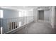 The second floor hallway has gray carpet and a cool zebra print at 4440 Pacific Crest Ave, Las Vegas, NV 89115