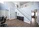 Bright living room featuring a high ceiling, staircase and hardwood floors at 4440 Pacific Crest Ave, Las Vegas, NV 89115