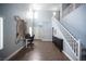 Bright and open living room featuring a staircase with a white railing at 4440 Pacific Crest Ave, Las Vegas, NV 89115