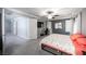 Spacious main bedroom featuring carpet, fan, king sized bed and a desk area at 4440 Pacific Crest Ave, Las Vegas, NV 89115