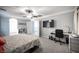 Spacious main bedroom featuring carpet, fan, king sized bed and a desk area at 4440 Pacific Crest Ave, Las Vegas, NV 89115