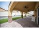 Spacious outdoor patio with brick pillars, ceiling fans and well manicured astroturf at 4440 Pacific Crest Ave, Las Vegas, NV 89115