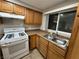 Updated kitchen showcasing modern countertops and a stainless steel double sink at 4770 Topaz St # 73, Las Vegas, NV 89121
