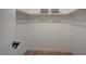 A clean and well-organized walk-in closet featuring ample shelving for storage at 5071 Pioneer Ave # 203, Las Vegas, NV 89146