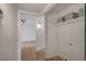 A laundry room with shelving, a light fixture, and space for a washer and dryer at 5071 Pioneer Ave # 203, Las Vegas, NV 89146