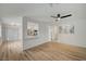 Open-concept living space with bar, wood-look flooring, and ample natural light at 5071 Pioneer Ave # 203, Las Vegas, NV 89146