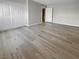 Bright bedroom with wood floors and large closet at 5286 River Glen Dr # 421, Las Vegas, NV 89103
