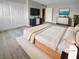Staged bedroom with white walls, a big bed, and custom closet and dresser at 5286 River Glen Dr # 421, Las Vegas, NV 89103