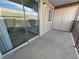 Concrete outdoor patio with views from the window and sliding glass doors at 5286 River Glen Dr # 421, Las Vegas, NV 89103