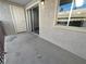 Concrete outdoor patio with views from the window and sliding glass doors at 5286 River Glen Dr # 421, Las Vegas, NV 89103