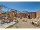 Backyard featuring a patio area, seating, and a BBQ grill, ideal for outdoor gatherings and enjoying leisure time at 5353 Dandelion Ct, North Las Vegas, NV 89031