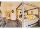 Spacious primary bedroom features vaulted ceiling, carpet flooring, wall decorations and ensuite access at 5353 Dandelion Ct, North Las Vegas, NV 89031