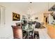 Spacious dining room open to the living area, featuring a lion art piece at 5353 Dandelion Ct, North Las Vegas, NV 89031