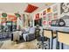Entertain in this converted garage with a TV, bar, arcade games, recliner seating, and unique decor at 5353 Dandelion Ct, North Las Vegas, NV 89031