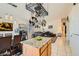 Kitchen featuring an island open to the dining and living area at 5353 Dandelion Ct, North Las Vegas, NV 89031