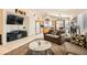 Inviting living room seamlessly connected to the kitchen and dining area at 5353 Dandelion Ct, North Las Vegas, NV 89031