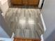 Bathroom featuring grey stone-look tiling and cabinets at 5425 Whisper Bluff St, North Las Vegas, NV 89031