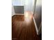 Home hallway showcasing wood floors and white trim, with gray walls at 5425 Whisper Bluff St, North Las Vegas, NV 89031