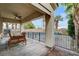 Inviting back patio with a covered dining area overlooking the pool and waterfall feature at 5588 Holcomb Bridge Ct, Las Vegas, NV 89149