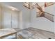 Spacious entryway with soaring ceilings, hardwood floors, and an open staircase at 5588 Holcomb Bridge Ct, Las Vegas, NV 89149